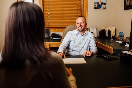 TJ at desk
